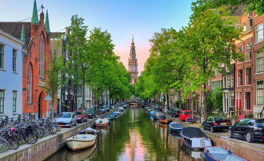 Amsterdam canal and tower