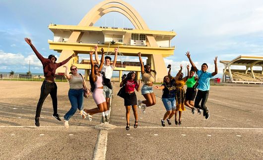 legon students jumping in the black star square