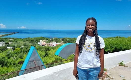 yucatan-student-overlooking-forested-area