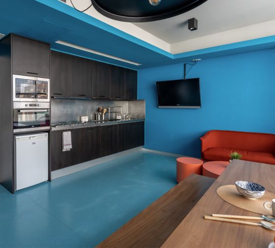 barcelona housing res hall shared kitchen blue walls