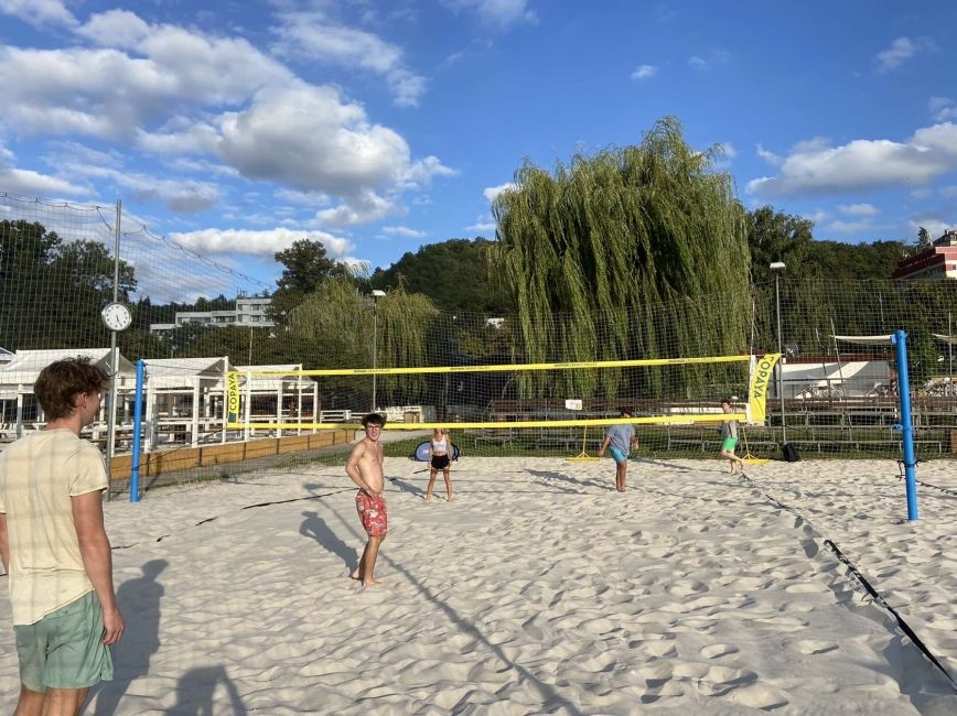 study abroad students volleyball beach