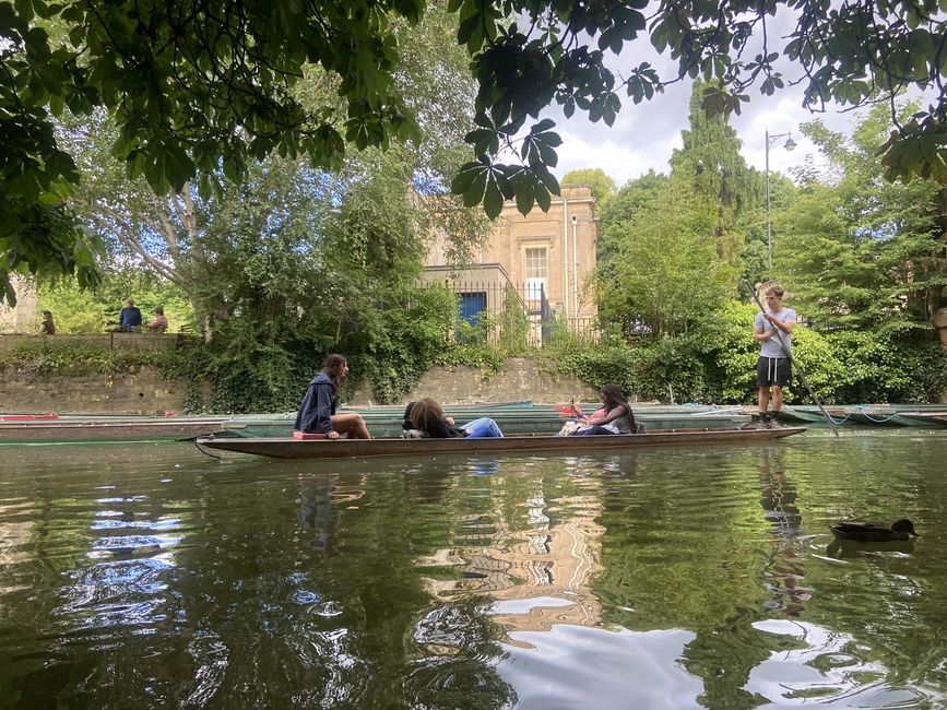 Students in a punting boat on a river in Oxford