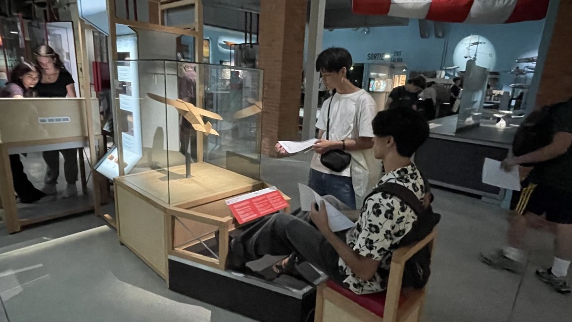 Students exploring early aviation technology 