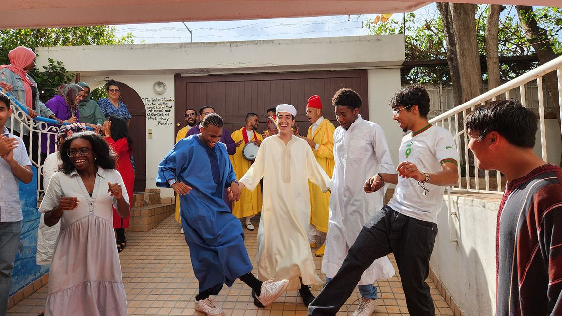 Students dancing with locals in Morocco