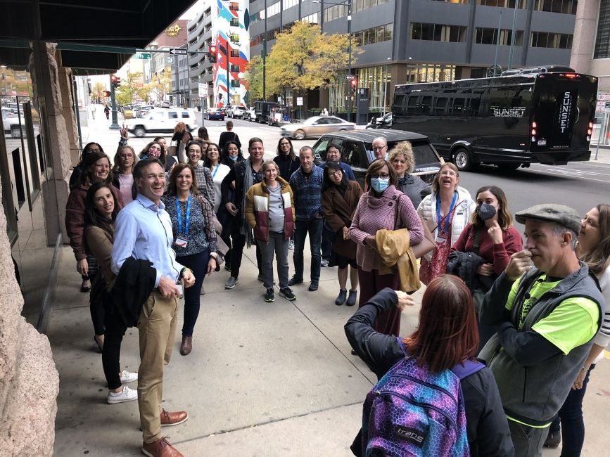 Group of CIEE employees outside hotel at symposium