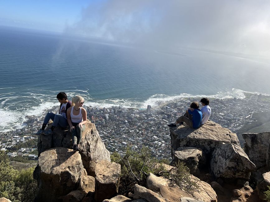 pax-sitting-on-cliffs-cape-town.jpeg