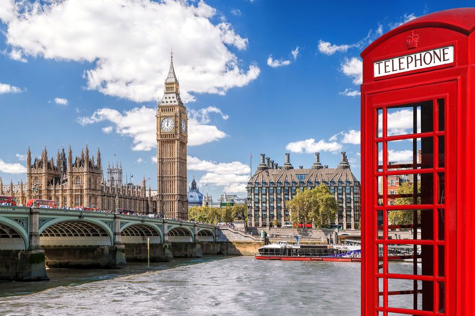 Phone booth by the side of the Thames River in London