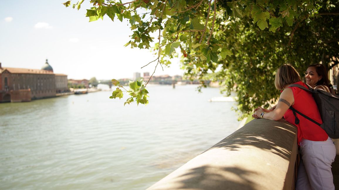 Teachers relaxing by the water while traveling abroad