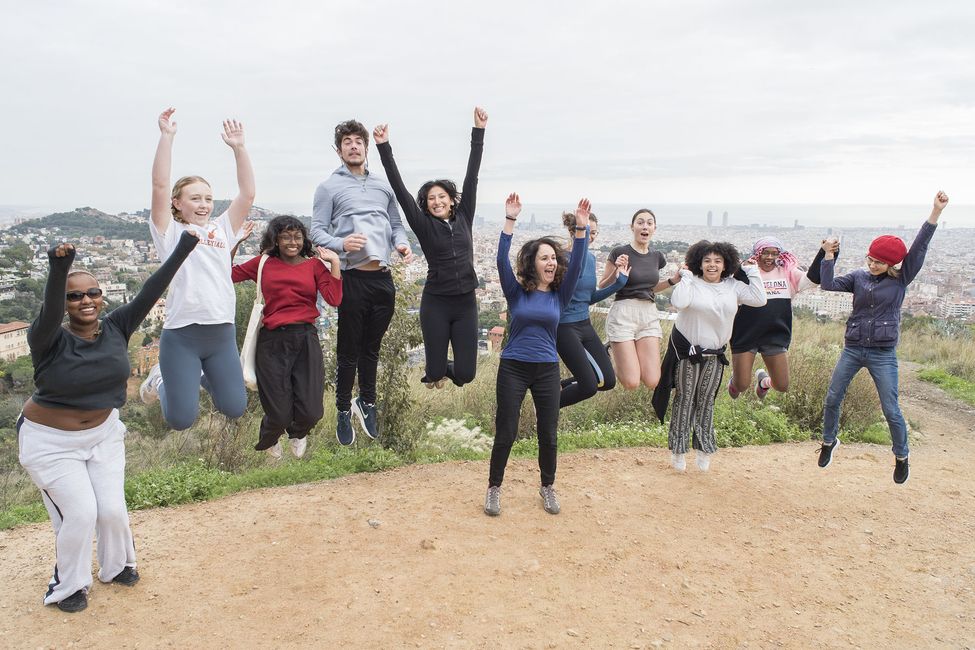 Program participants jumping in the air during excursion while studying abroad