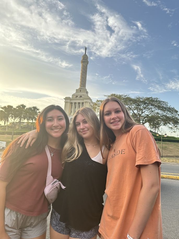 Gabi, Sari, and June in front of El Monumento de Santiago.