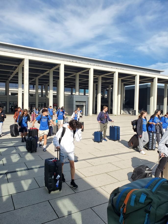 Moving from Berlin airport to our busses