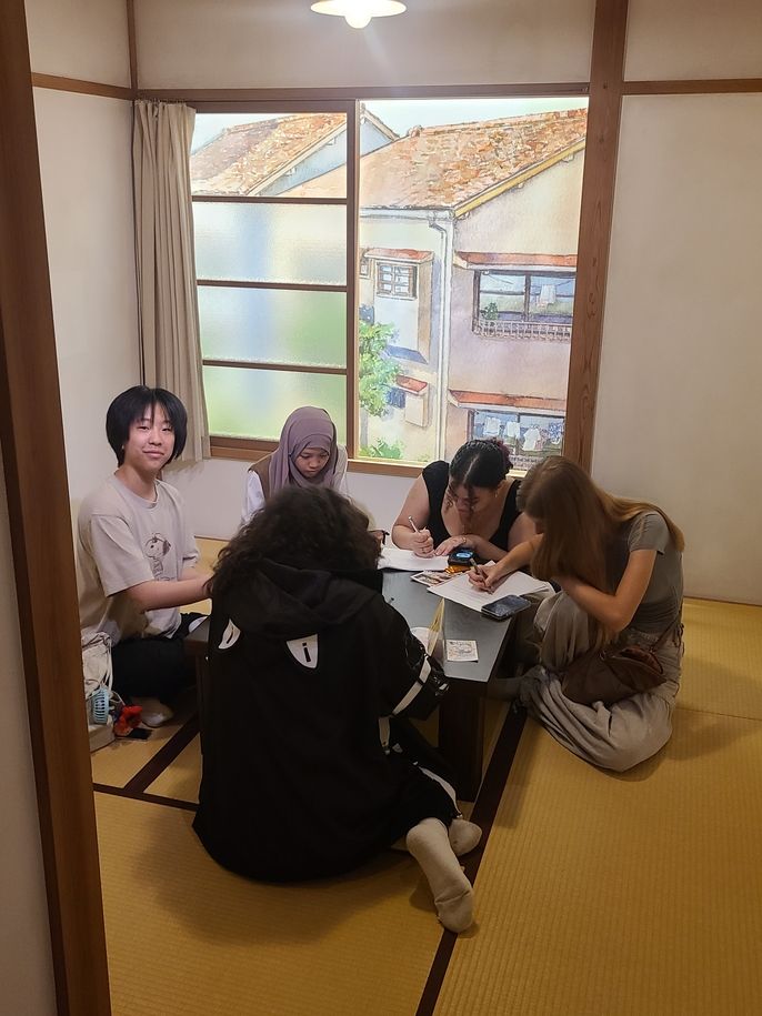Students work on their classwork in the historic Tokiwaso building, where many manga artists first started their careers.