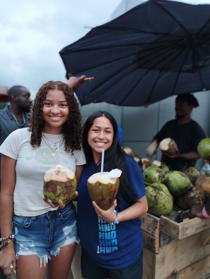 Coconut stands and kubes in hand
