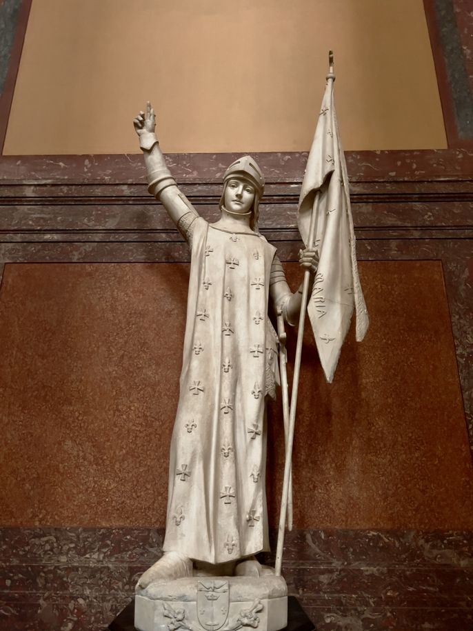 a statue inside the cathedral of saint Pierre