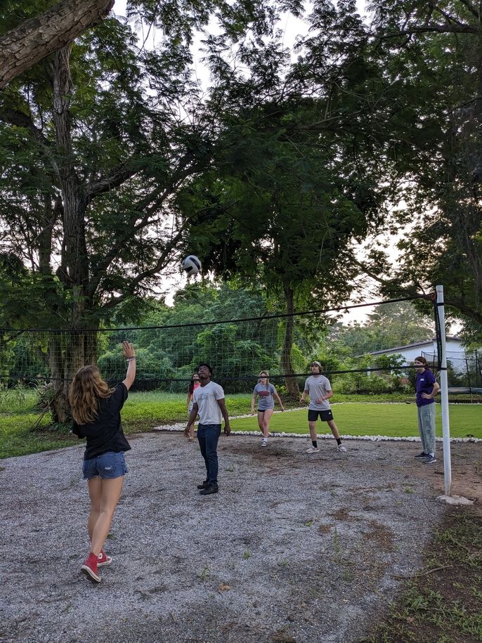 A section of the students enjoying a game of volleyball at CIEE Legon Study Center
