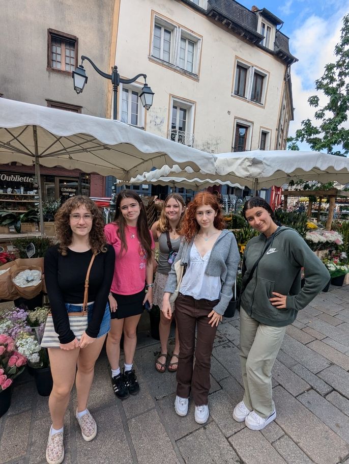 four female students from CIEE at the Marché de Lices