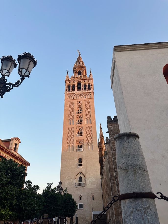 seville abroad clock tower building sunset