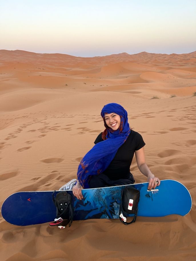 study abroad student abroad desert snowboarding