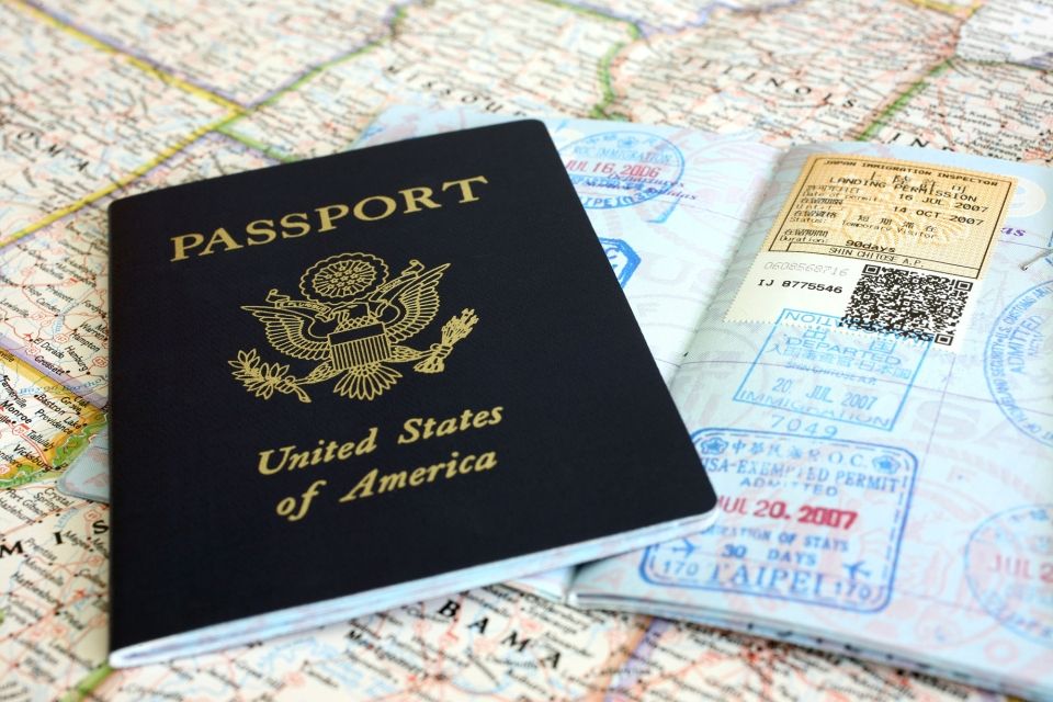 Passport books resting on a world map