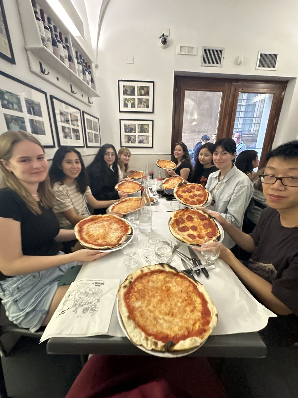 Students trying Italian pizza for the first time!