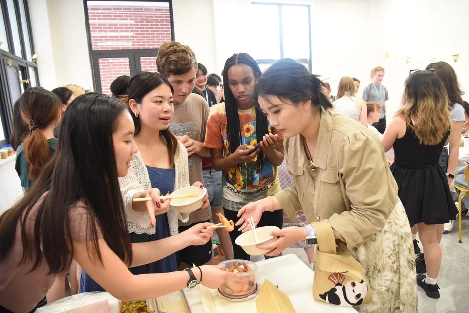 Offering up some delicious eats to one of the judges!