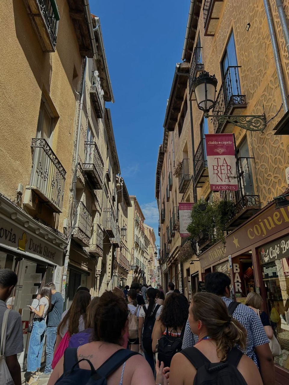 Students walking through the streets of Segovia.