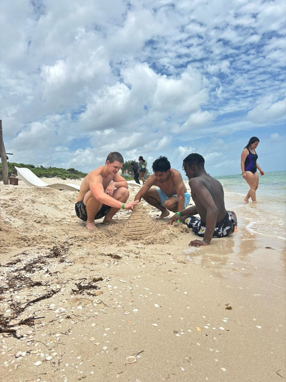 Group of students doing a castle