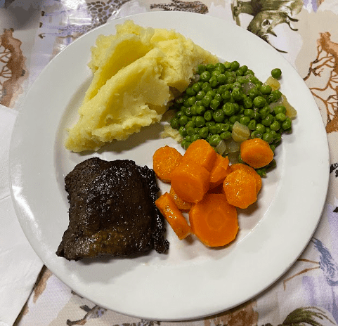 Beef, potatoes and vegetables.