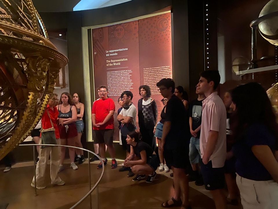 Students Listening to Their Tour Guide at the Galileo Museum