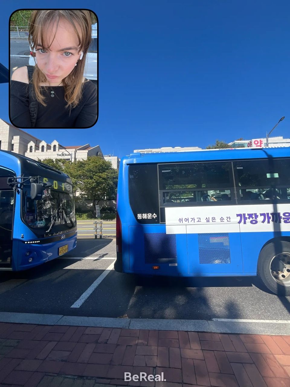 Bereal of Lucy at a bus stop