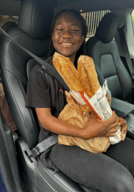 Student holding bread